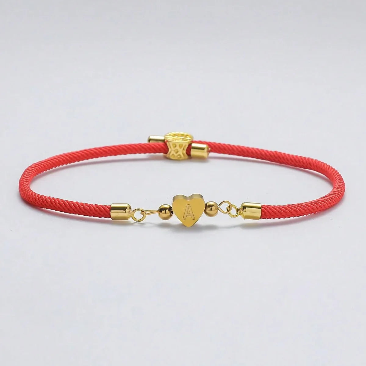 Pulsera Hilo con Iniciales Doradas