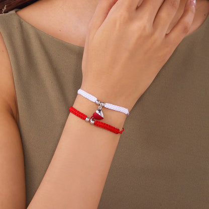 Par de Pulseras Hilo Corazón - Unidos con Imán