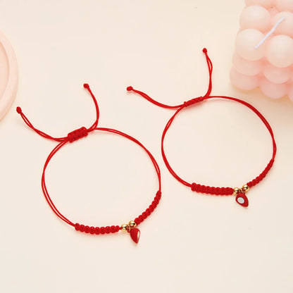 Par de Pulseras Hilo Corazón - Unidos con Imán