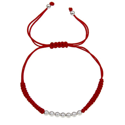 Pulsera Hilo Rojo con nudos y esferas plateadas