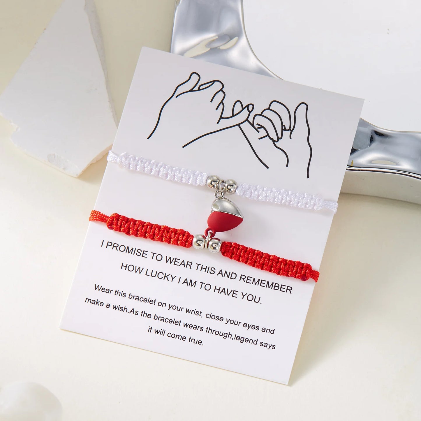 Par de Pulseras Hilo Corazón - Unidos con Imán